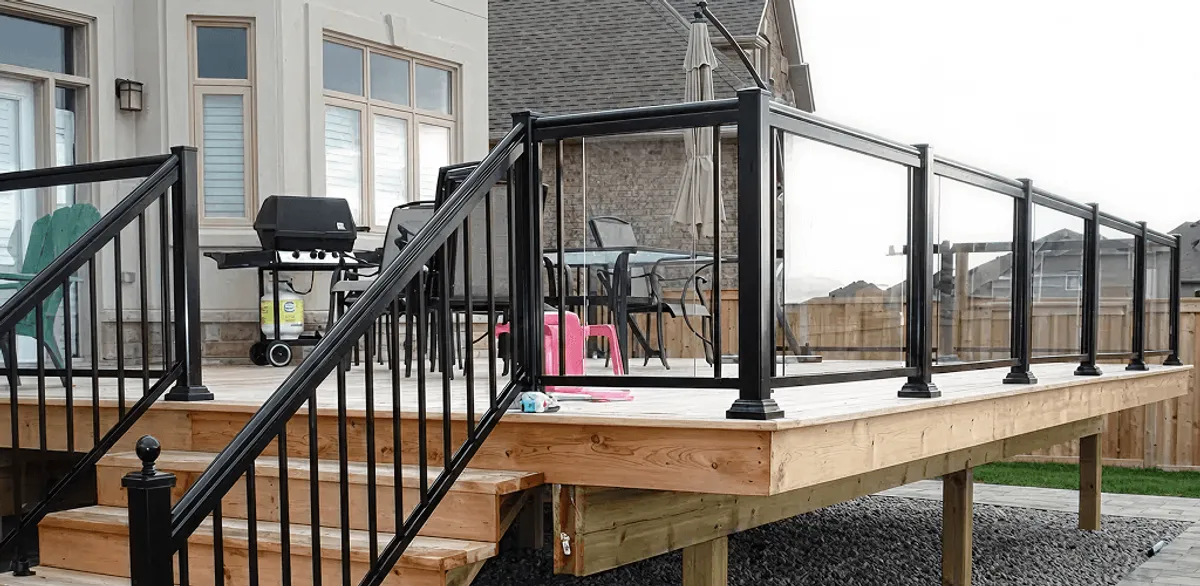 Handrail installation on a deck staircase for safety and code compliance in Salt Lake City, UT